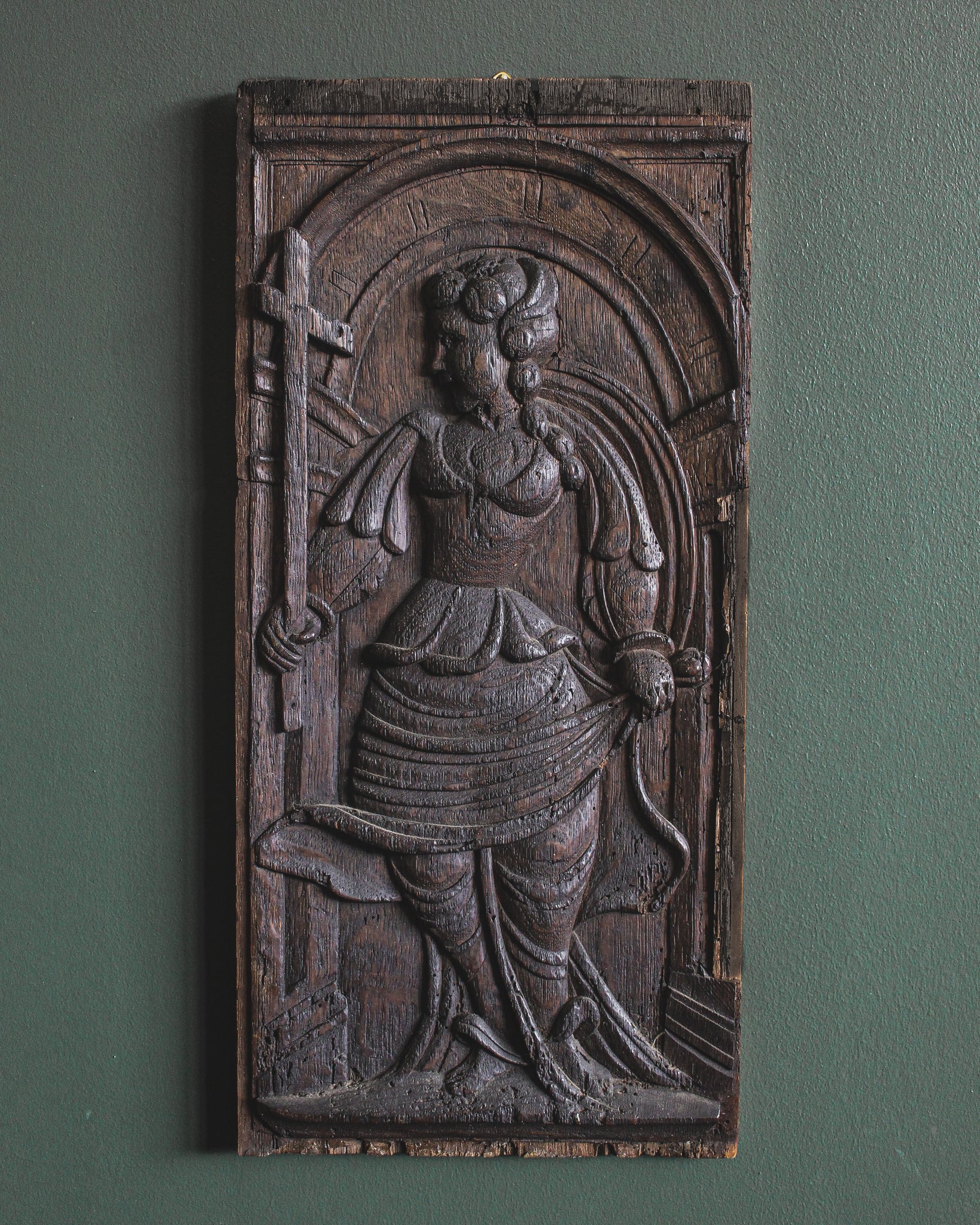 16th Century Carved Panel of Woman Saint Holding Cross