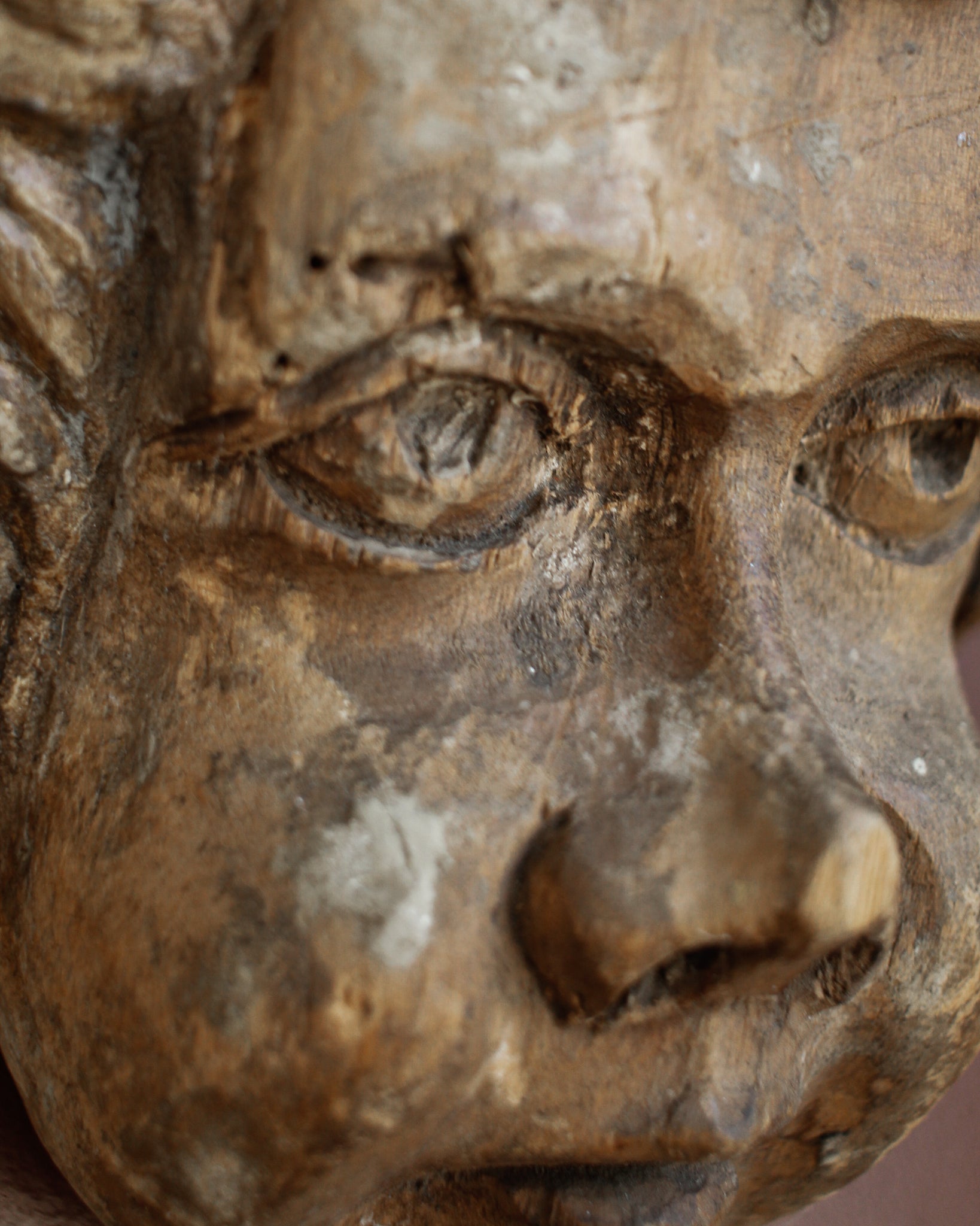 Carved Cherub’s Head with Polychrome Remnants