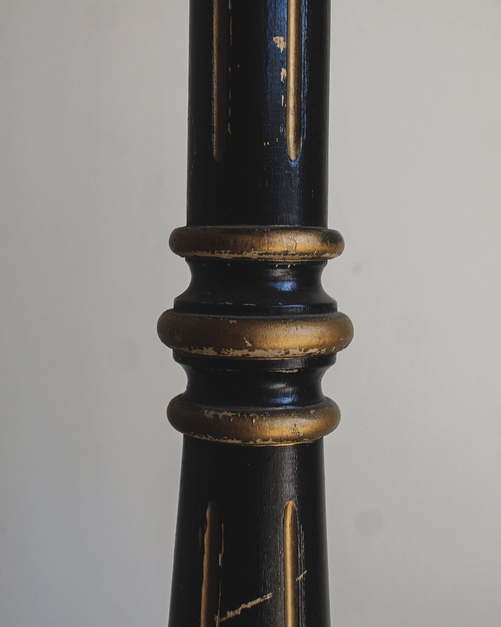 Tall Black and Gold Candlestick Pair